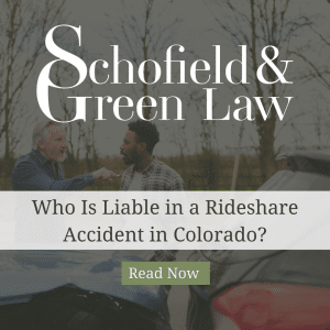 A picture of two men arguing with each other after an accident with a blog title that reads: "Who Is Liable in a Rideshare Accident in Colorado?"